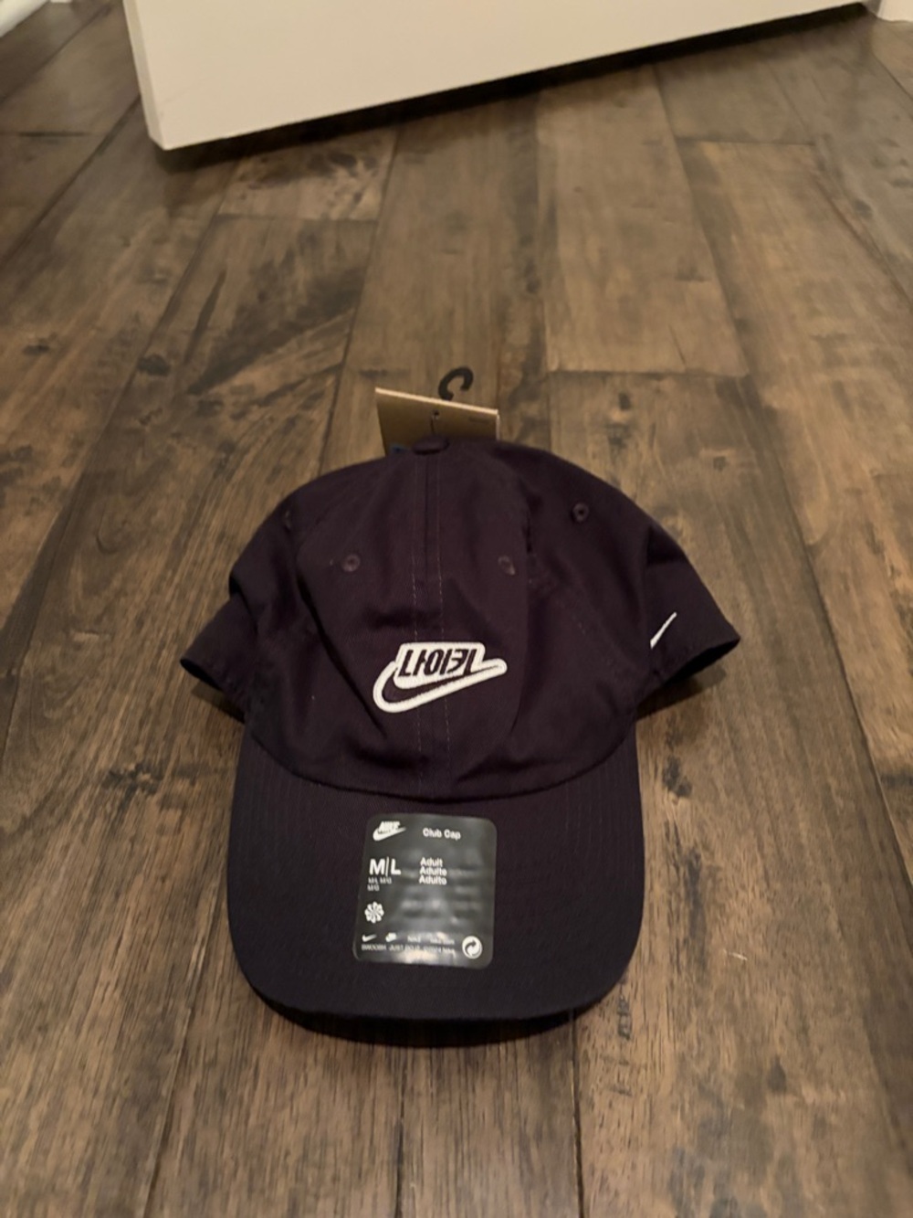 Nike Men's Black Dad Cap with White Swoosh Logo in Korean writing